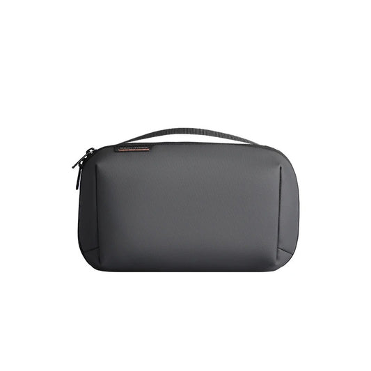 Mark Ryden Tech Organizer Pouch in gray design with top handle, ideal for storing cables and gadgets. Durable, compact, and water-resistant.