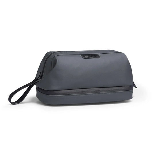 Mark Ryden Compact Toiletry Pouch Organizer in dark gray with dual compartments and wrist strap. Water-resistant and ideal for travel essentials.