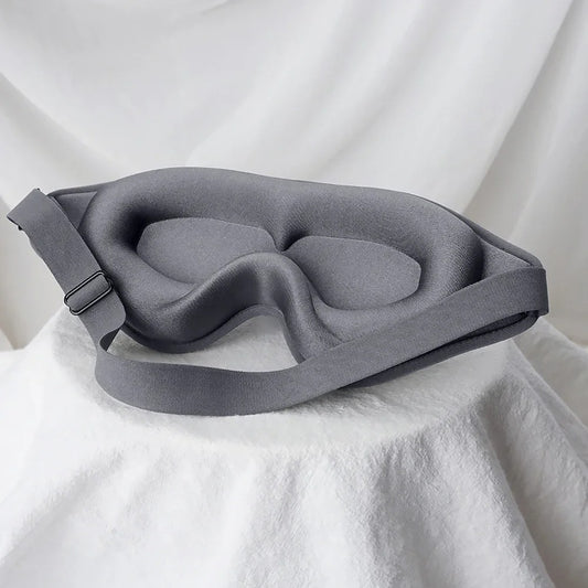 Premium Sleep Travel Mask with adjustable strap and contoured eye padding for full light blocking. Ideal for travel and comfortable sleep support.