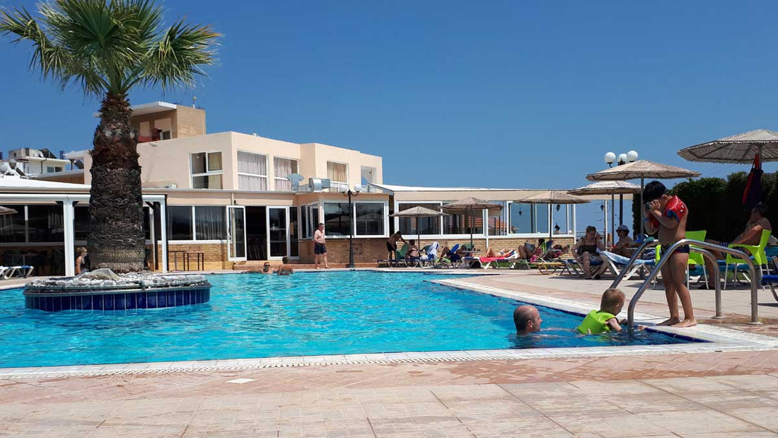 Father and son enjoying a swim at the resort